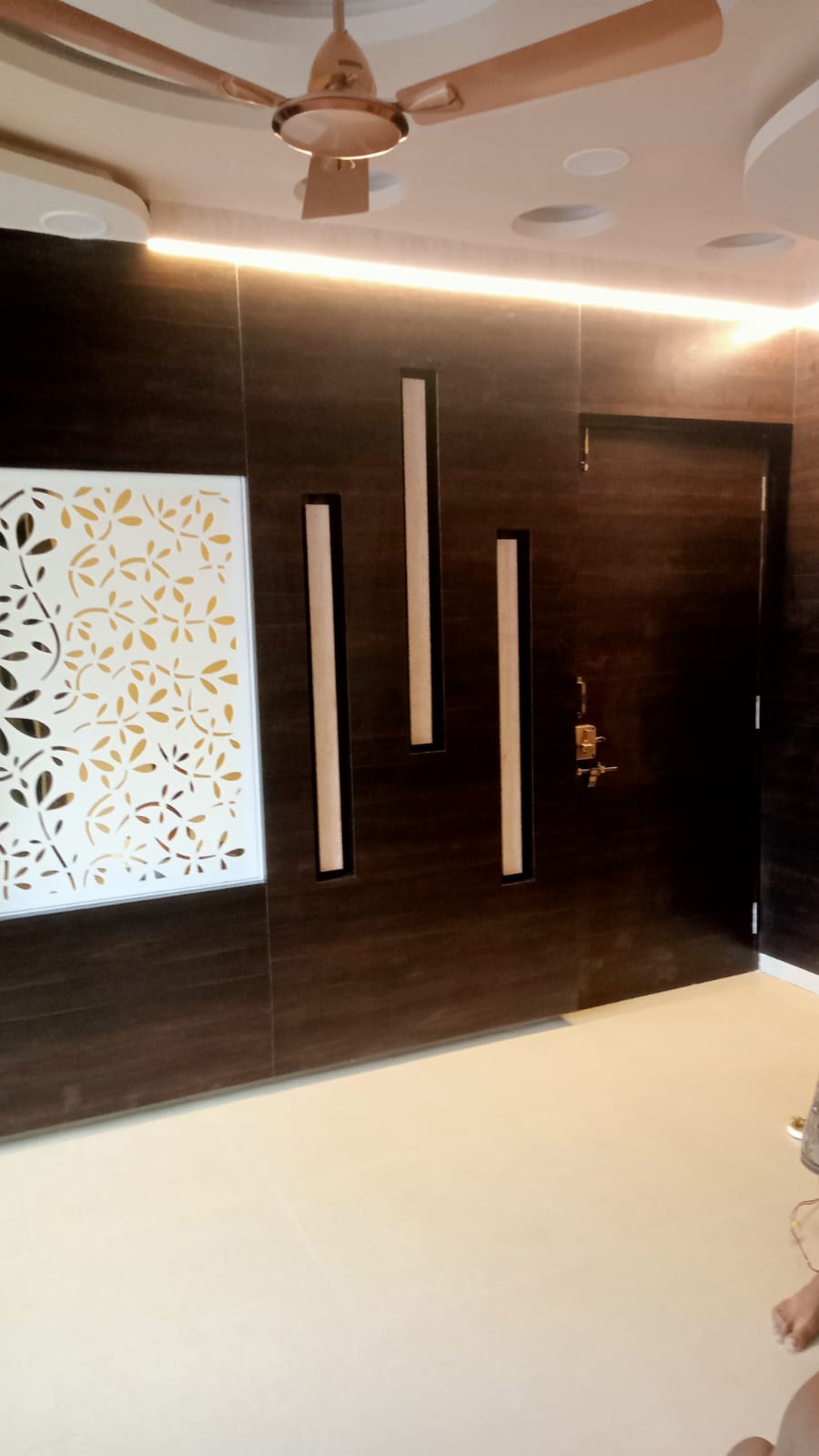 Dark Walnut Entrance Panelling with Backlit CNC Floral Screen