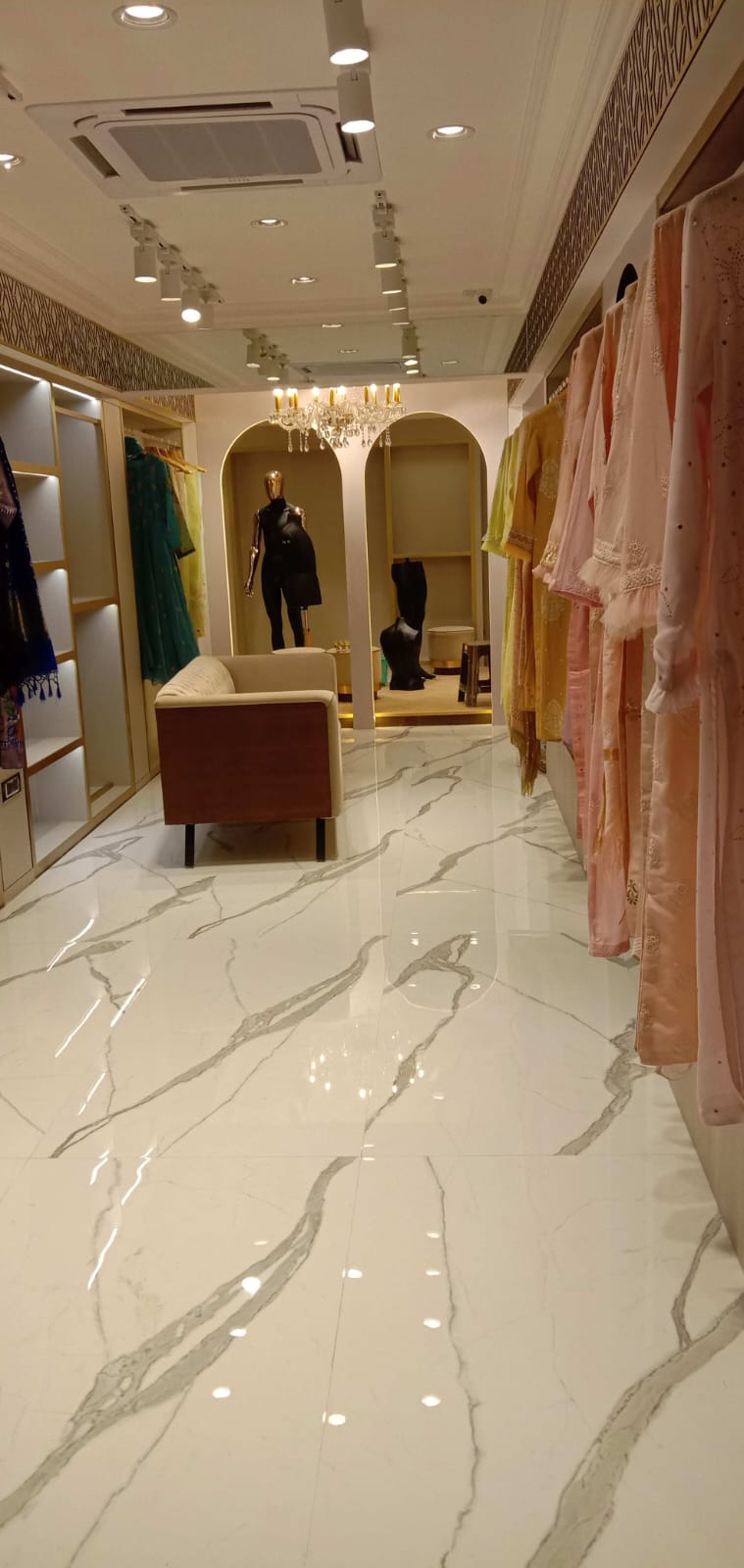 Commercial Boutique Showroom with Statuario Floor & Display Racks